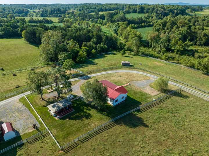 Aerial view of the farmhouse and its grounds at Whindale Ranch