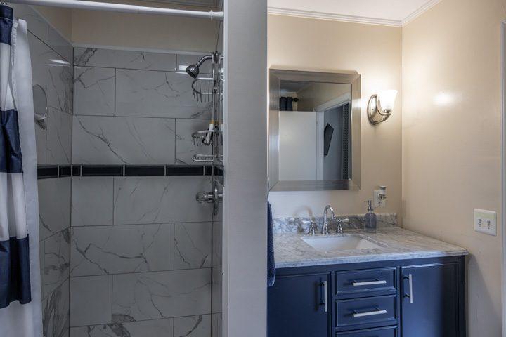 Bathroom with a tiled walk-in shower