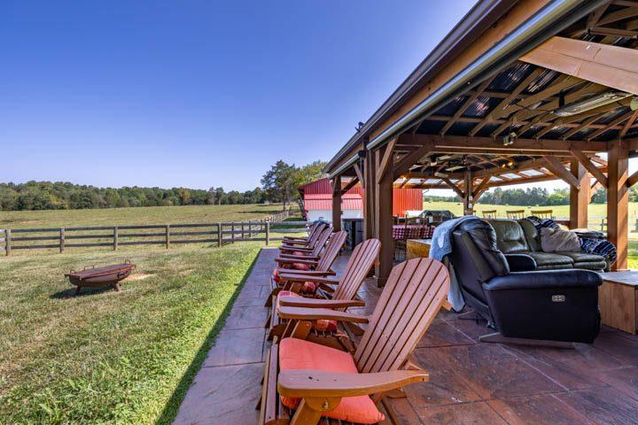 Adirondack chairs and lounge seating under the pavilion roof