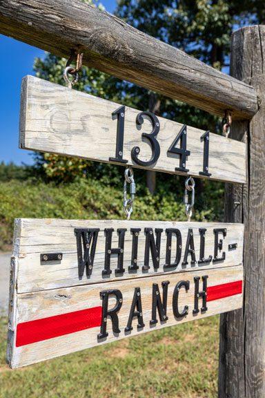 Hand-painted Whindale Ranch sign at 1341
